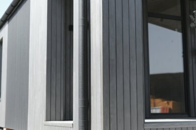 grey cladding installed on the exterior of a house