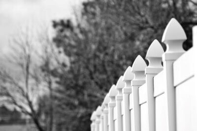 white fence posts