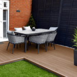 composite decking garden with modern garden furniture - teak / amber