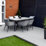 composite decking garden with modern garden furniture - light grey / stone