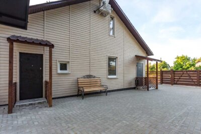 beautiful house with cladding installed on the exterior