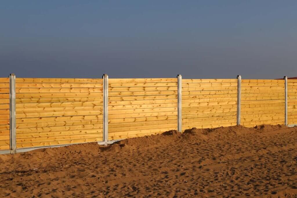 modern wooden fence installed horizontally