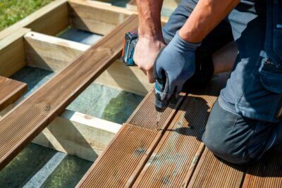 installer fixing up a decking