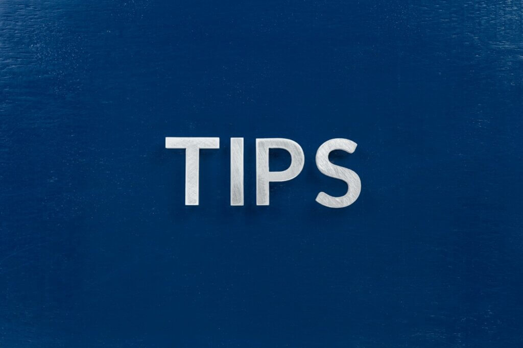 word TIPS with a blue background